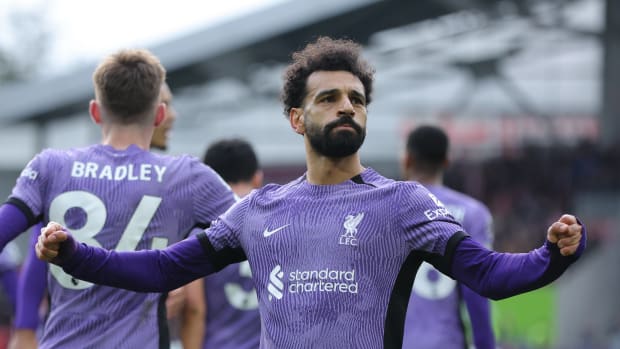 Mo Salah pictured celebrating after scoring a goal in Liverpool's 4-1 win at Brentford in February 2024